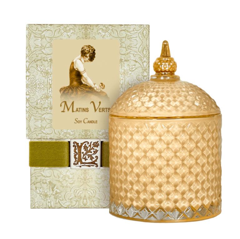 Matins Verts Luxury Soy Candle in decorative glass jar with ornate packaging.