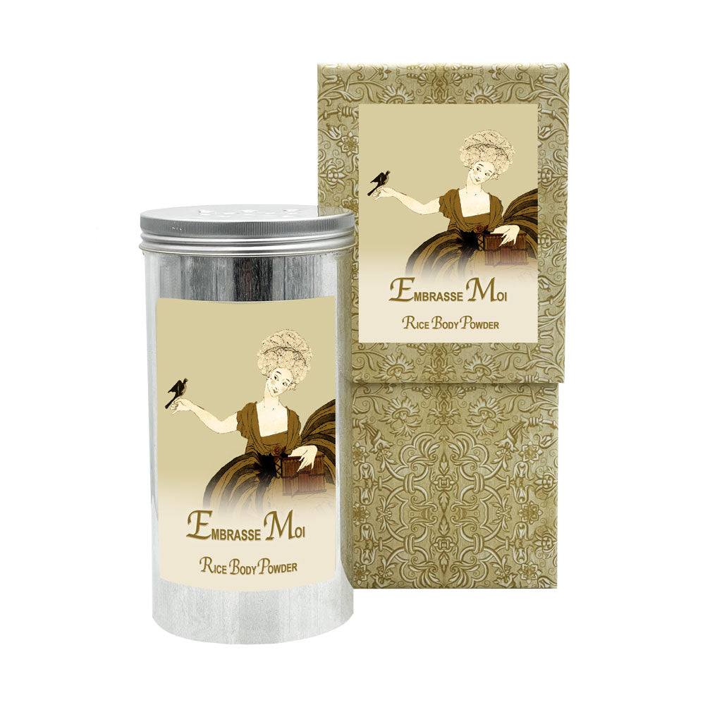 Embrasse Moi Rice Body Powder in aluminum canister with decorative packaging.
