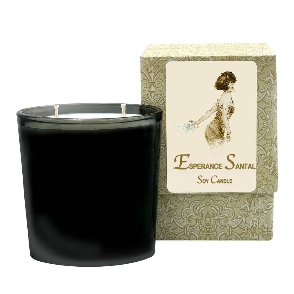 Esperance Santal medium candle in handmade oval glass jar, burns 60-70 hours with green geranium, saffron, sandalwood notes.