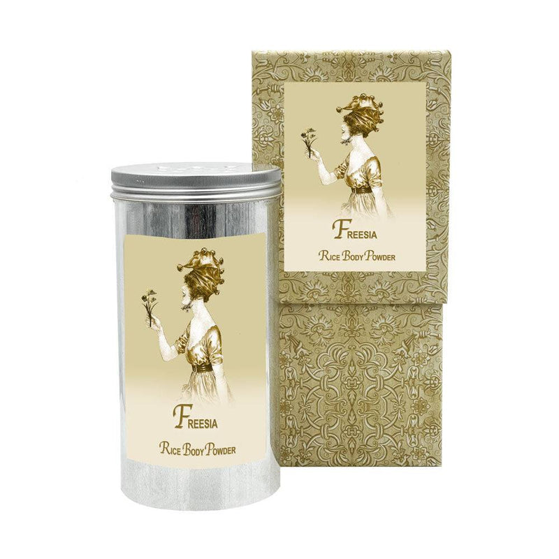 Freesia Rice Body Powder in aluminum canister with elegant packaging.
