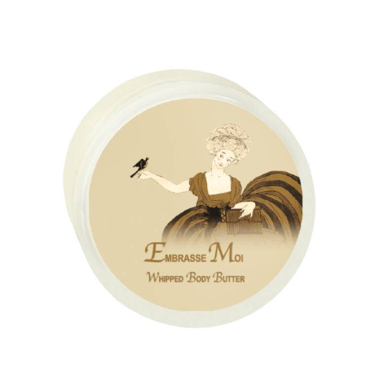 Embrasse Moi Argan Oil Whipped Body Butter 8oz container with elegant design.