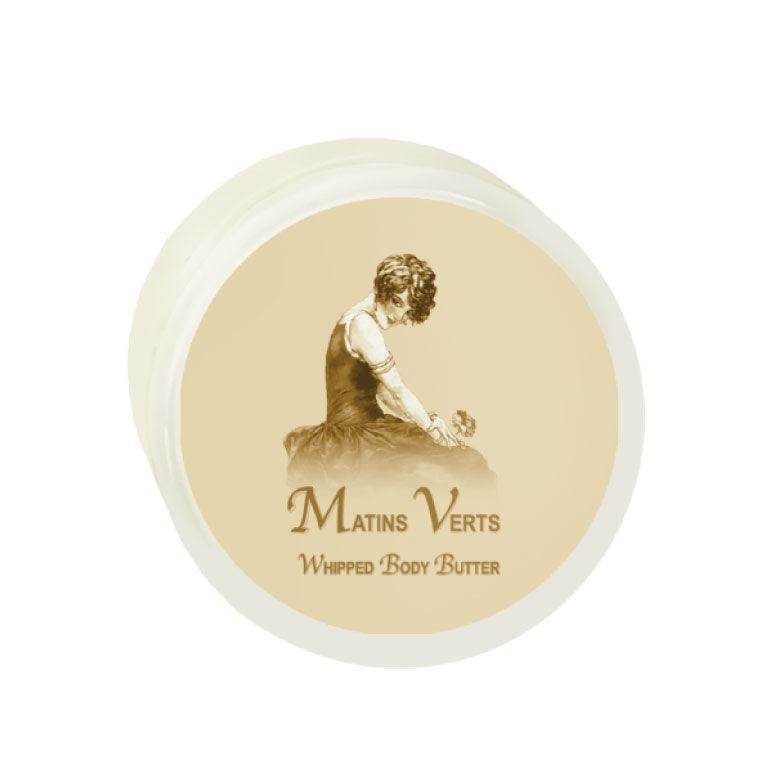 Matins Verts Argan Oil Whipped Body Butter 8oz. in cream jar, enriched with argan oil and shea butter for deep hydration.