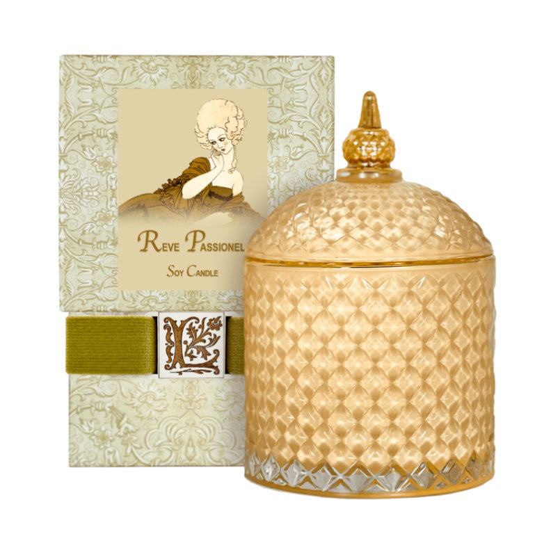 Reve Passionel Luxury Soy Candle in ornate glass jar with decorative packaging.