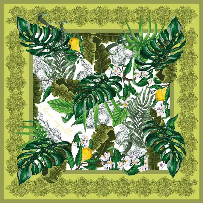 Silk blend scarf with green and yellow tropical print and hand-rolled edges.