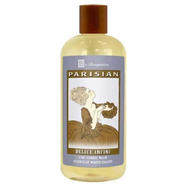 Delice Infini Fine Fabric Wash 19oz bottle with a classic design, crafted for delicate fabrics, containing plant-based ingredients and essential oils.