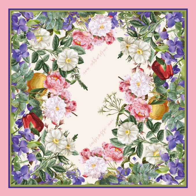 Floral silk blend scarf with vibrant colors and hand-rolled edges.