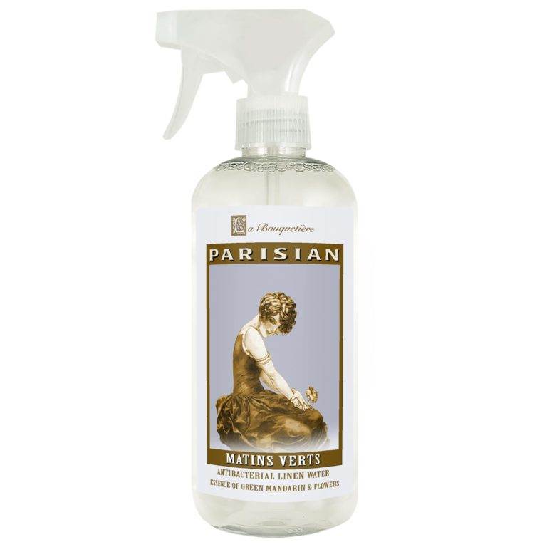 Matins Verts Antibacterial Linen Water 19oz bottle with spray nozzle, featuring vintage illustration on label.
